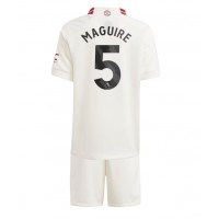 Otroški Nogometni dresi Manchester United Harry Maguire #5 Tretji 2023-24 Kratek Rokav (+ Kratke hlače)